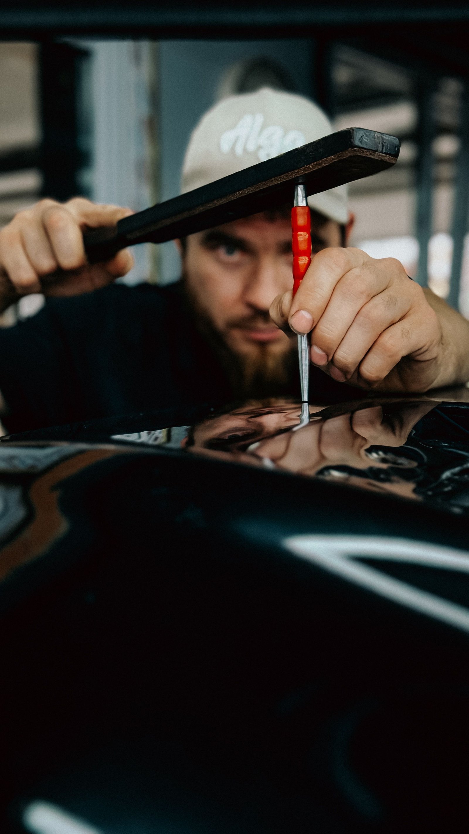 Automotive technician working on a vehicle