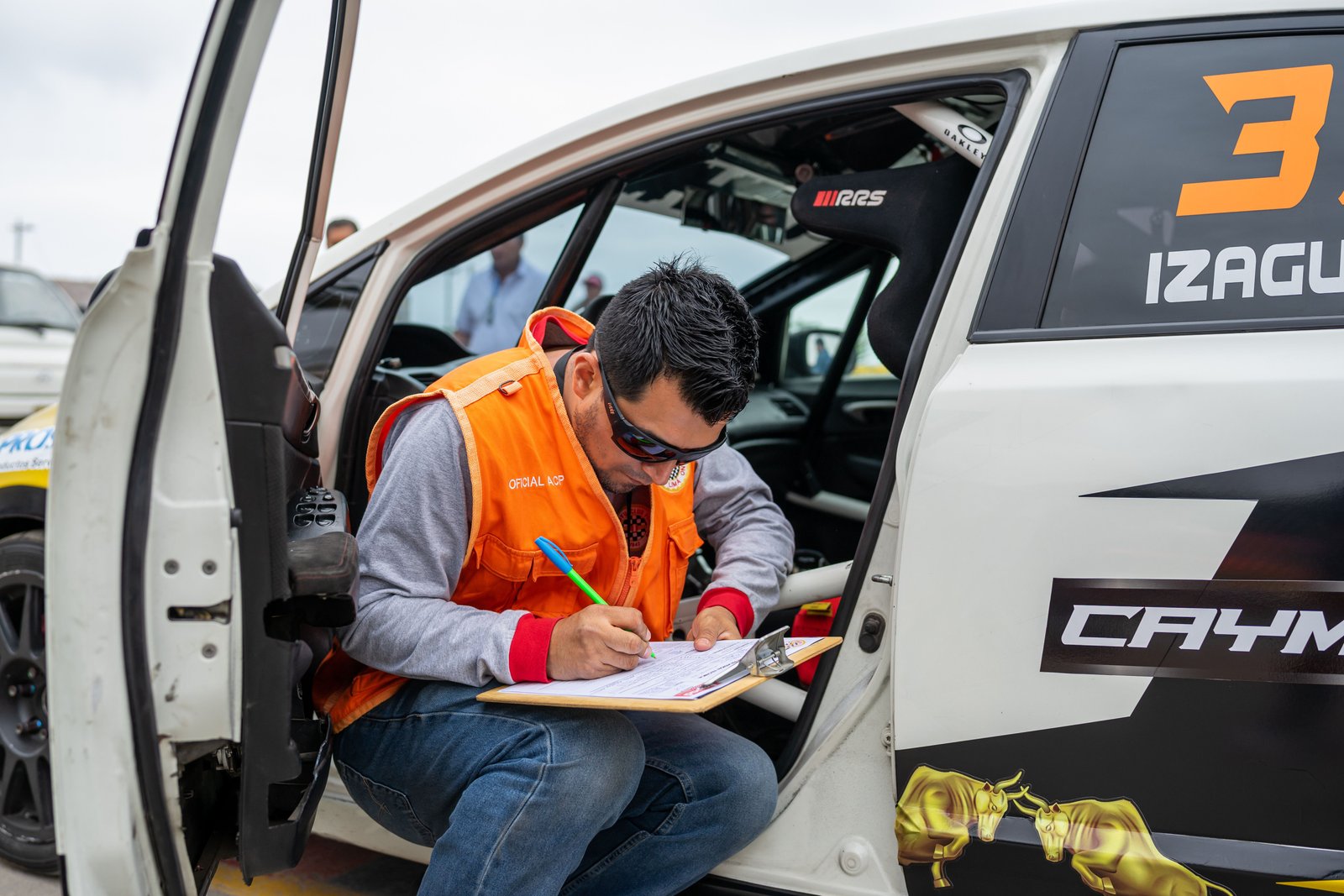 Technician inspecting a vehicle